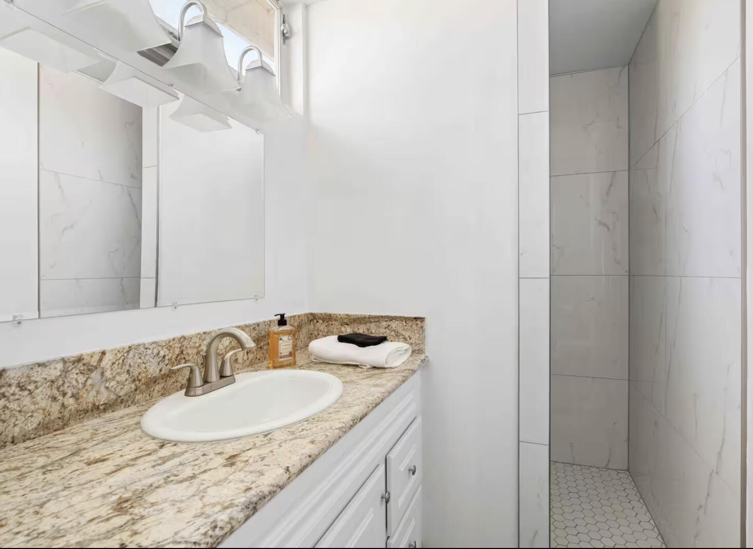 280 North Monterey Road Palm Springs, CA 92262 - Photo 21 of 29 a bathroom with a sink and a mirror