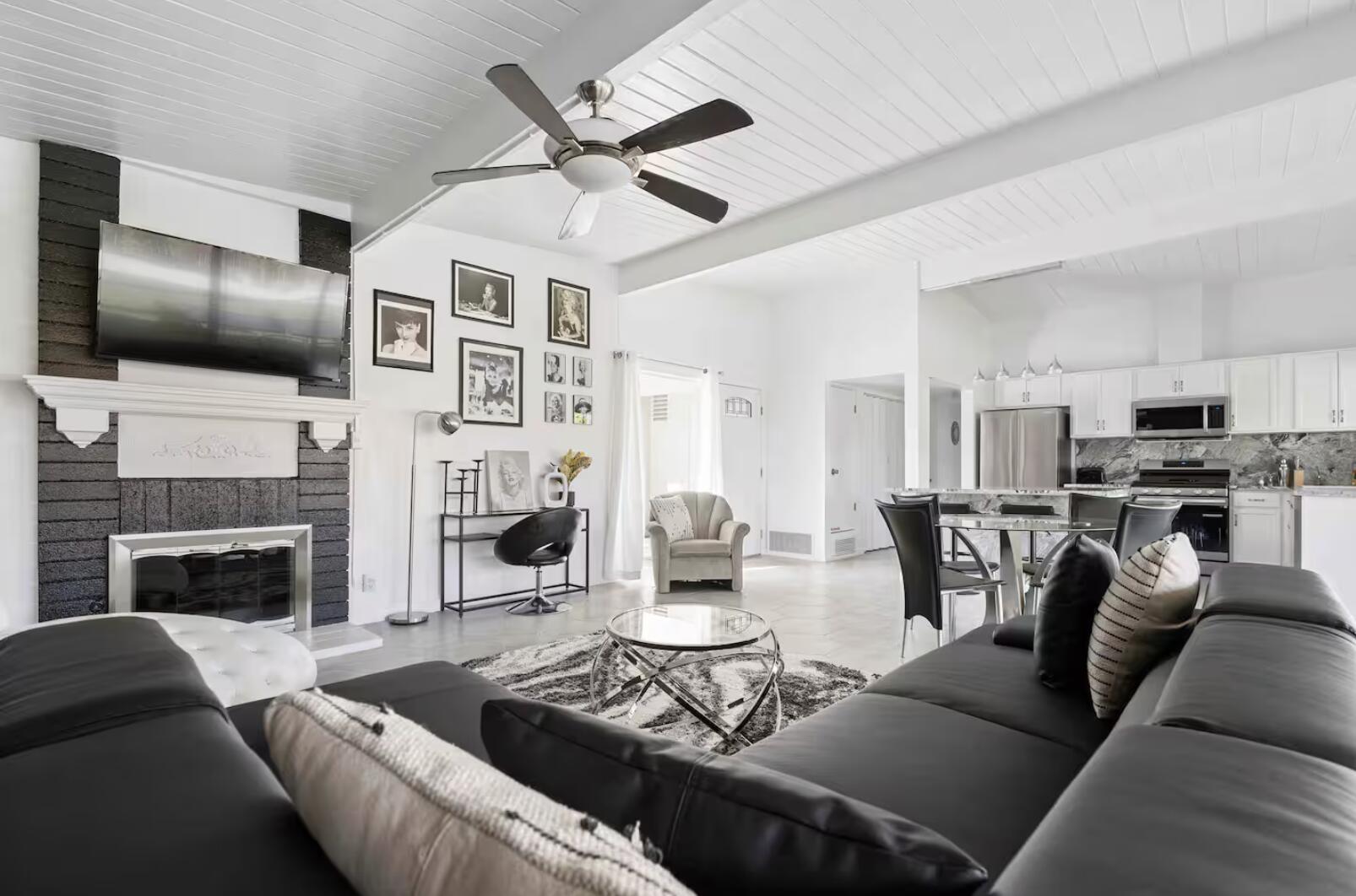 280 North Monterey Road Palm Springs, CA 92262 - Photo 4 of 29 a living room with furniture fireplace and flat screen tv