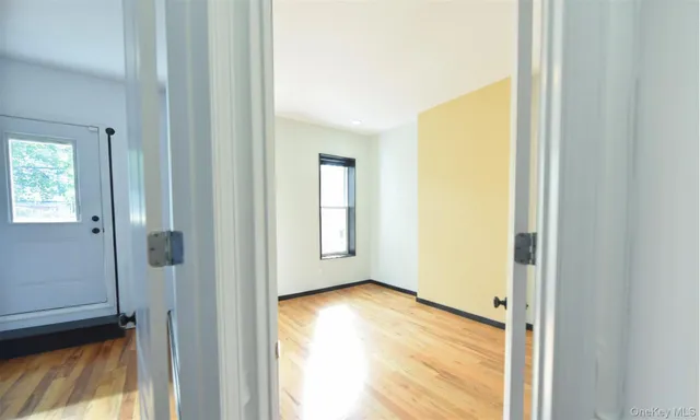 a view of an empty room and window