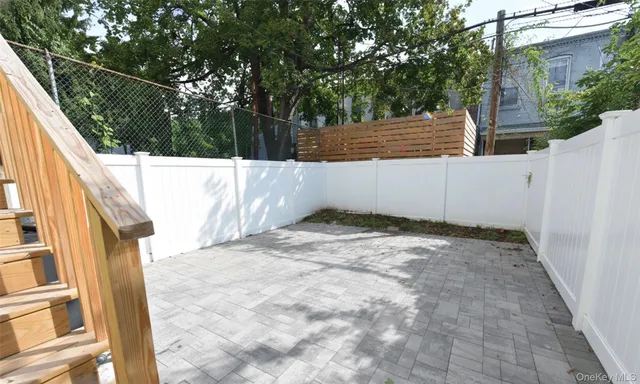 a view of a backyard of the house