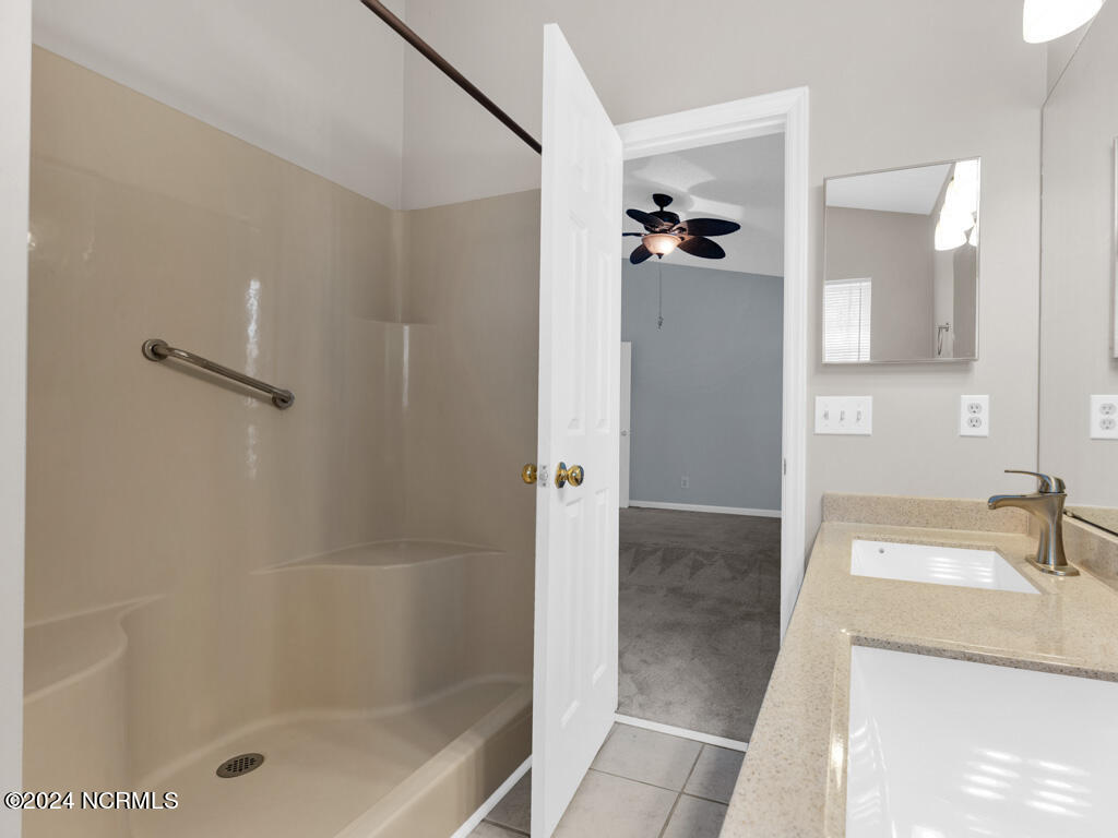 409 Deer Path Calabash, NC 28467 - Photo 16 of 32 Ensuite bathroom with a shower