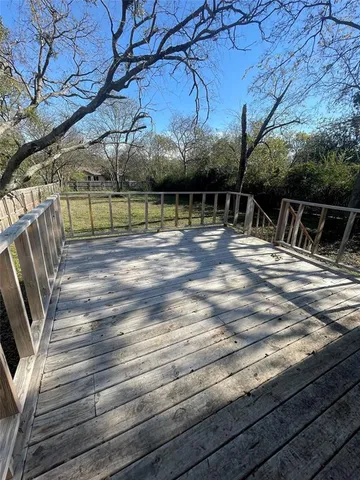 a view of a backyard with sitting area