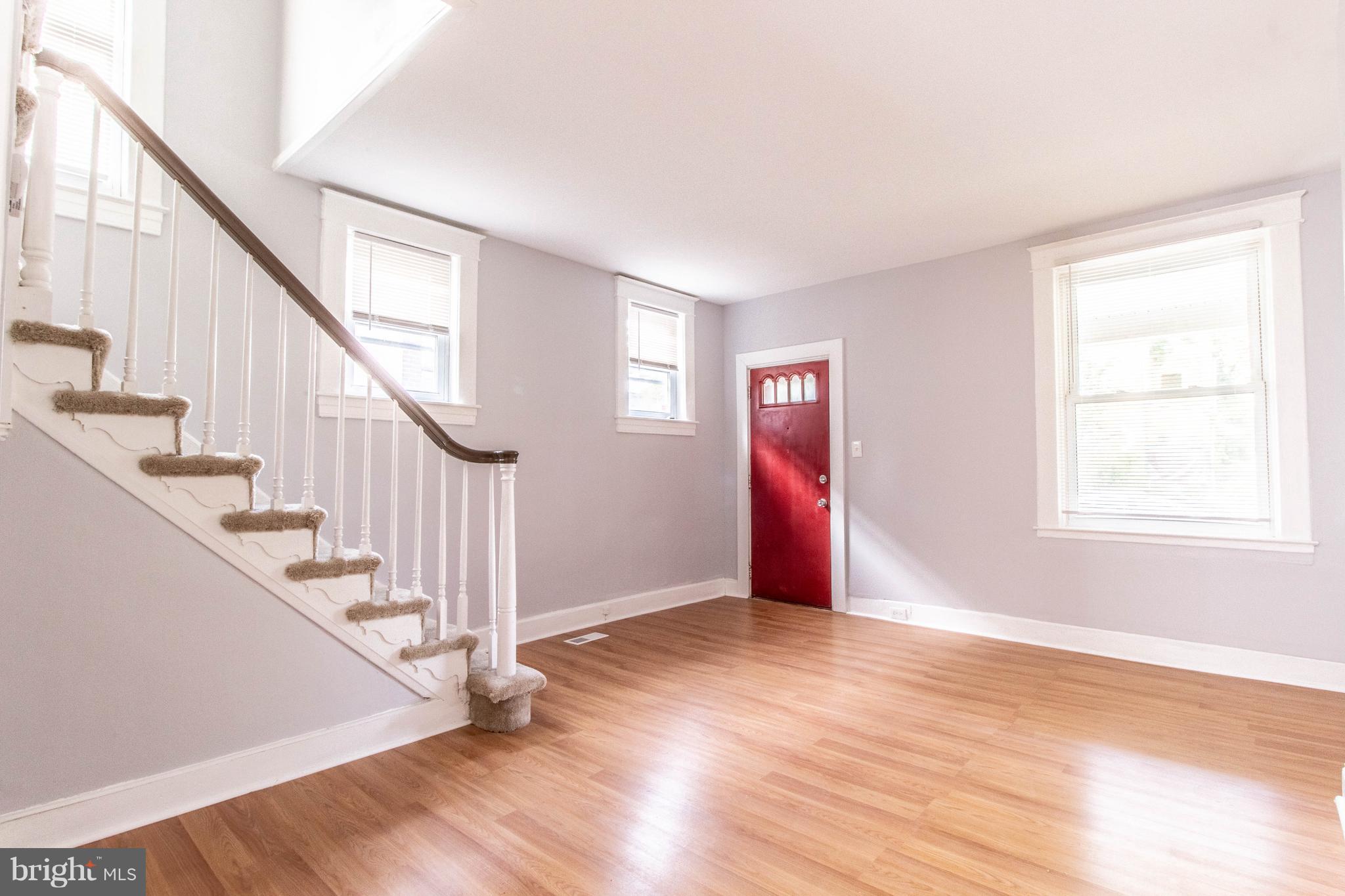 605 Benninghaus Road Baltimore, MD 21212 - Photo 2 of 30 a view of entryway and hall with wooden floor