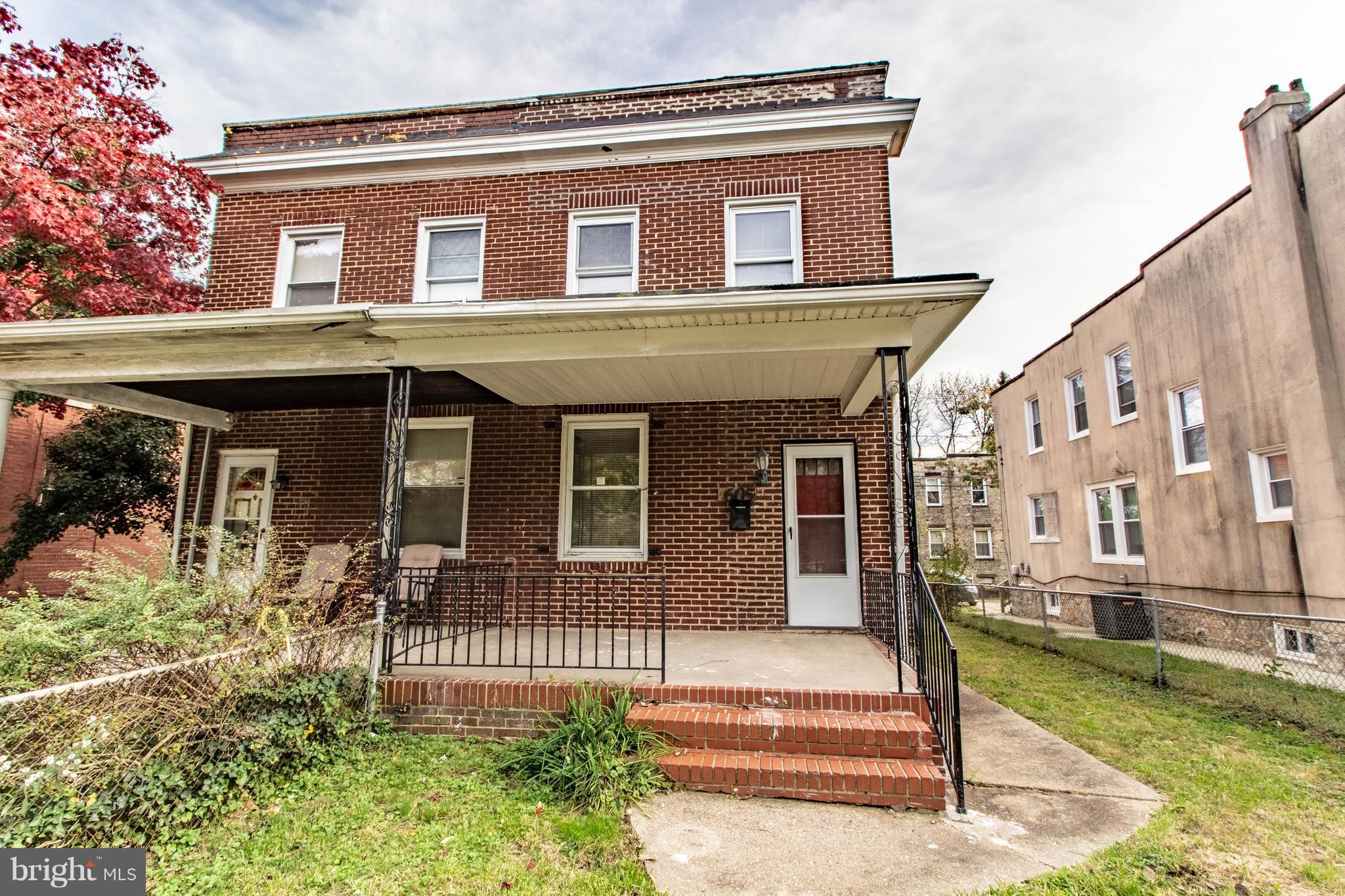 605 Benninghaus Road Baltimore, MD 21212 - Photo 24 of 30 a front view of a house with a yard