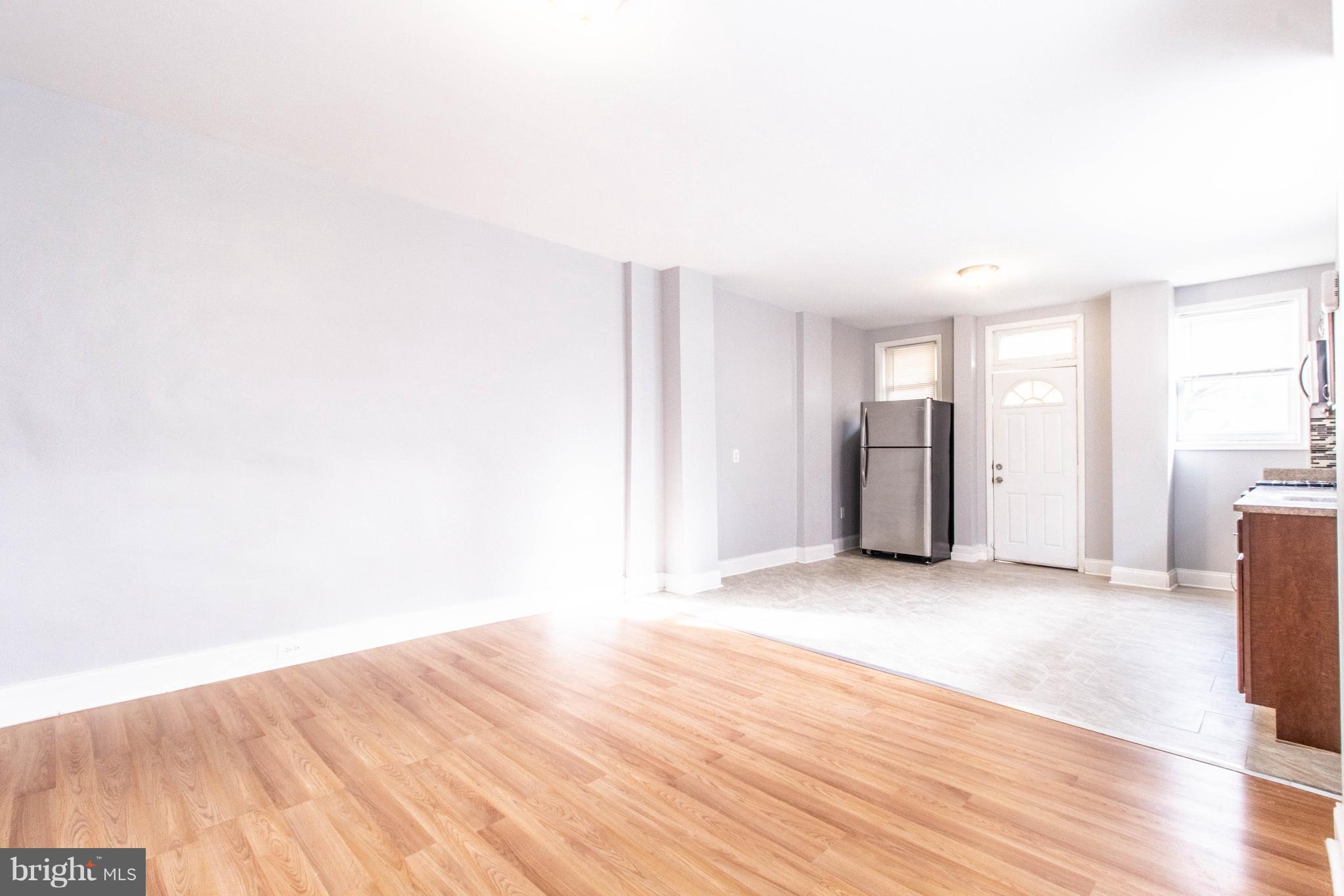 605 Benninghaus Road Baltimore, MD 21212 - Photo 8 of 30 a view of empty room with wooden floor