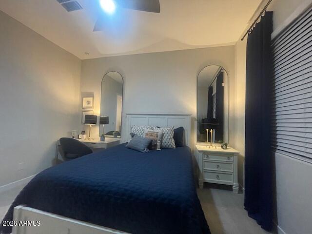 9625 West Monterey Way, Unit B Phoenix, AZ 85392 - Photo 14 of 22 a bedroom with bed and window