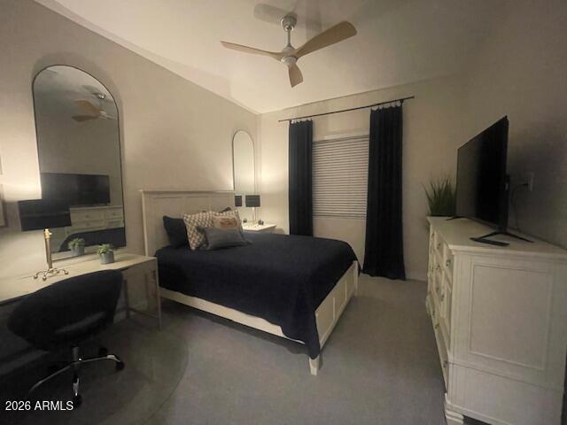 9625 West Monterey Way, Unit B Phoenix, AZ 85392 - Photo 17 of 22 a bedroom with a bed and a television