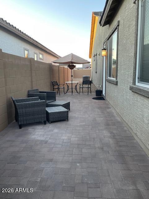 9625 West Monterey Way, Unit B Phoenix, AZ 85392 - Photo 22 of 22 a couches and table in a house