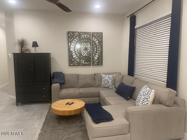 9625 West Monterey Way, Unit B Phoenix, AZ 85392 - Photo 7 of 22 a living room with furniture and a window