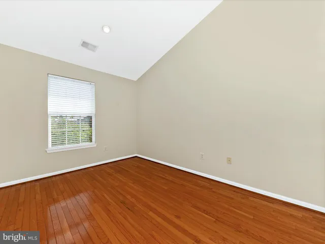 a bathroom with a sink a mirror and a shower