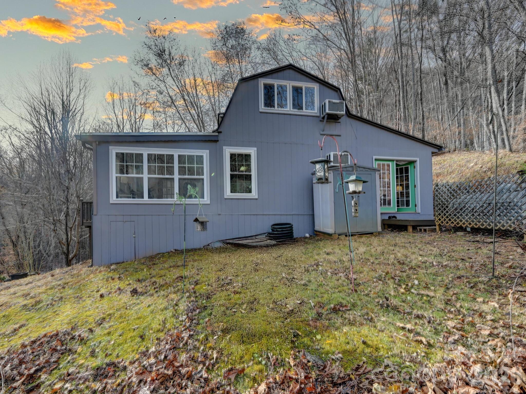 90 Davidson Gap Road Leicester, NC 28748 - Photo 28 of 46 a front view of a house with garden