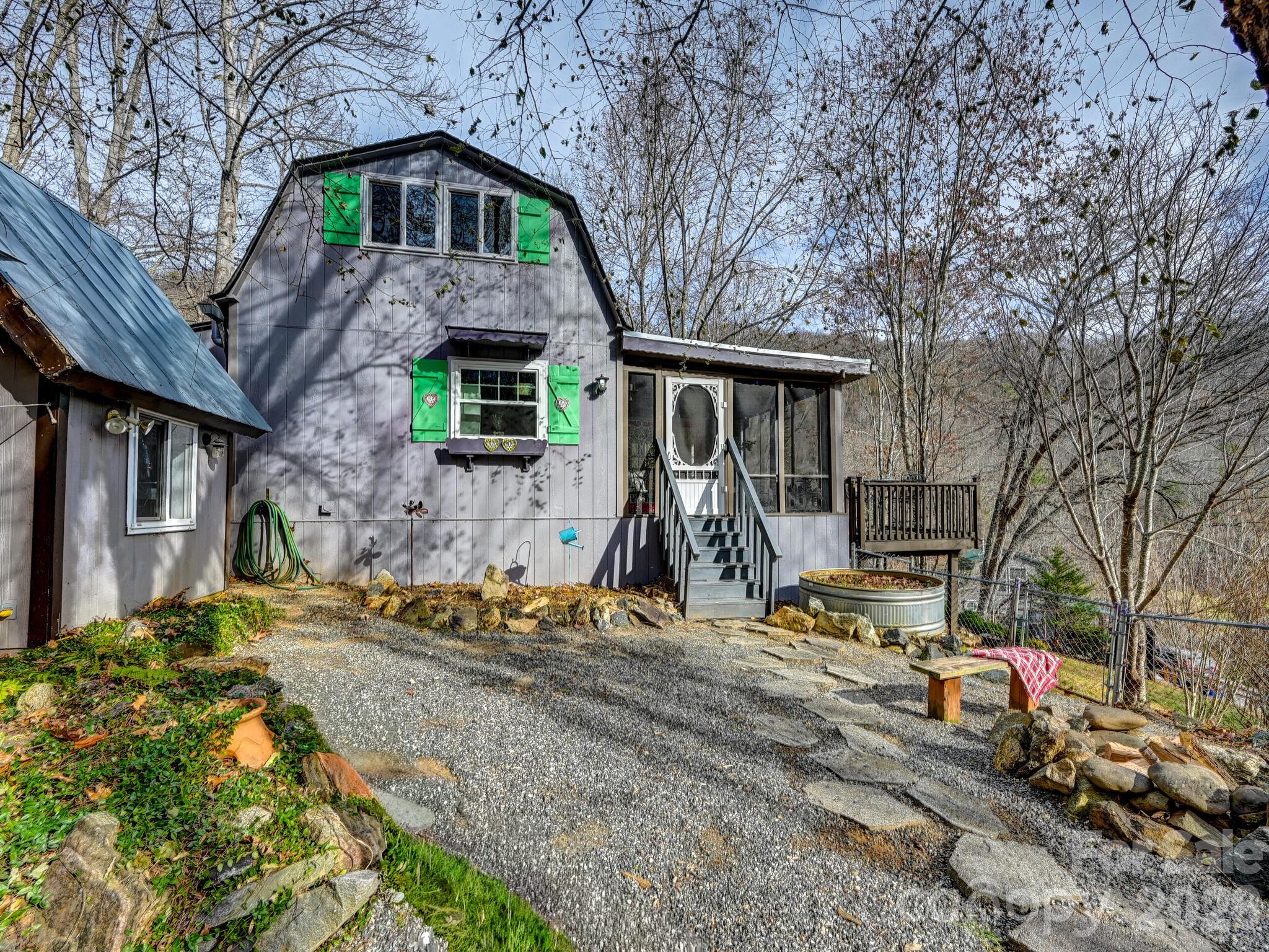 90 Davidson Gap Road Leicester, NC 28748 - Photo 29 of 46 a front view of a house with garden