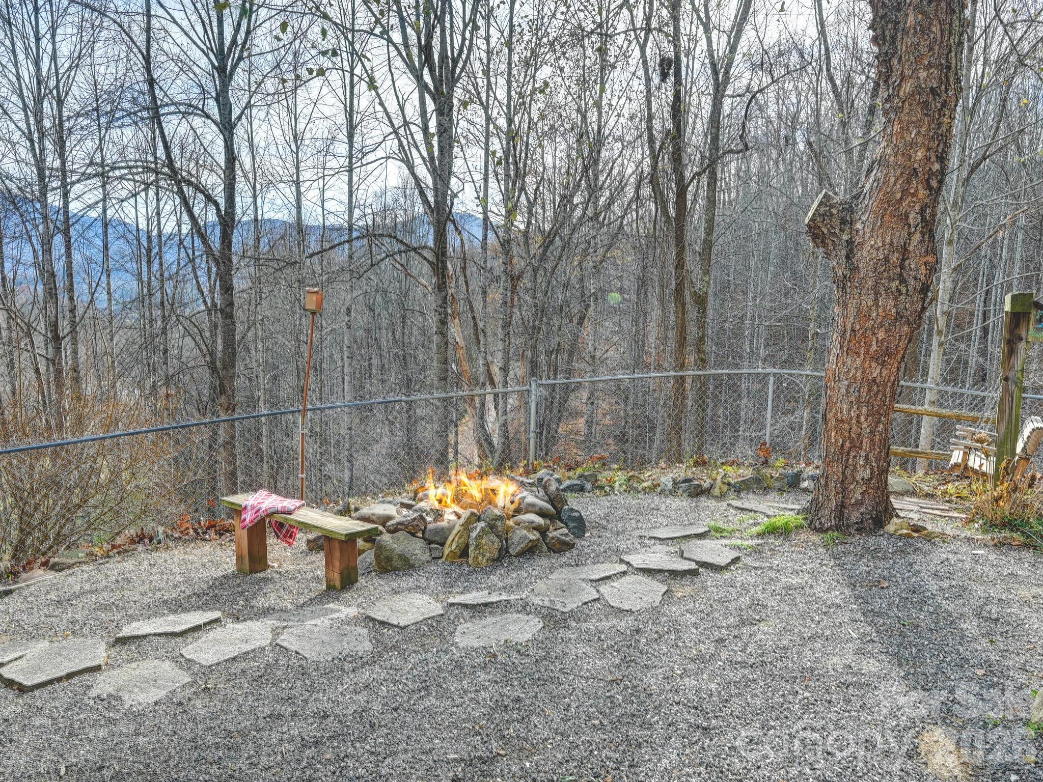90 Davidson Gap Road Leicester, NC 28748 - Photo 30 of 46 a view of a yard with sitting area and entertaining space