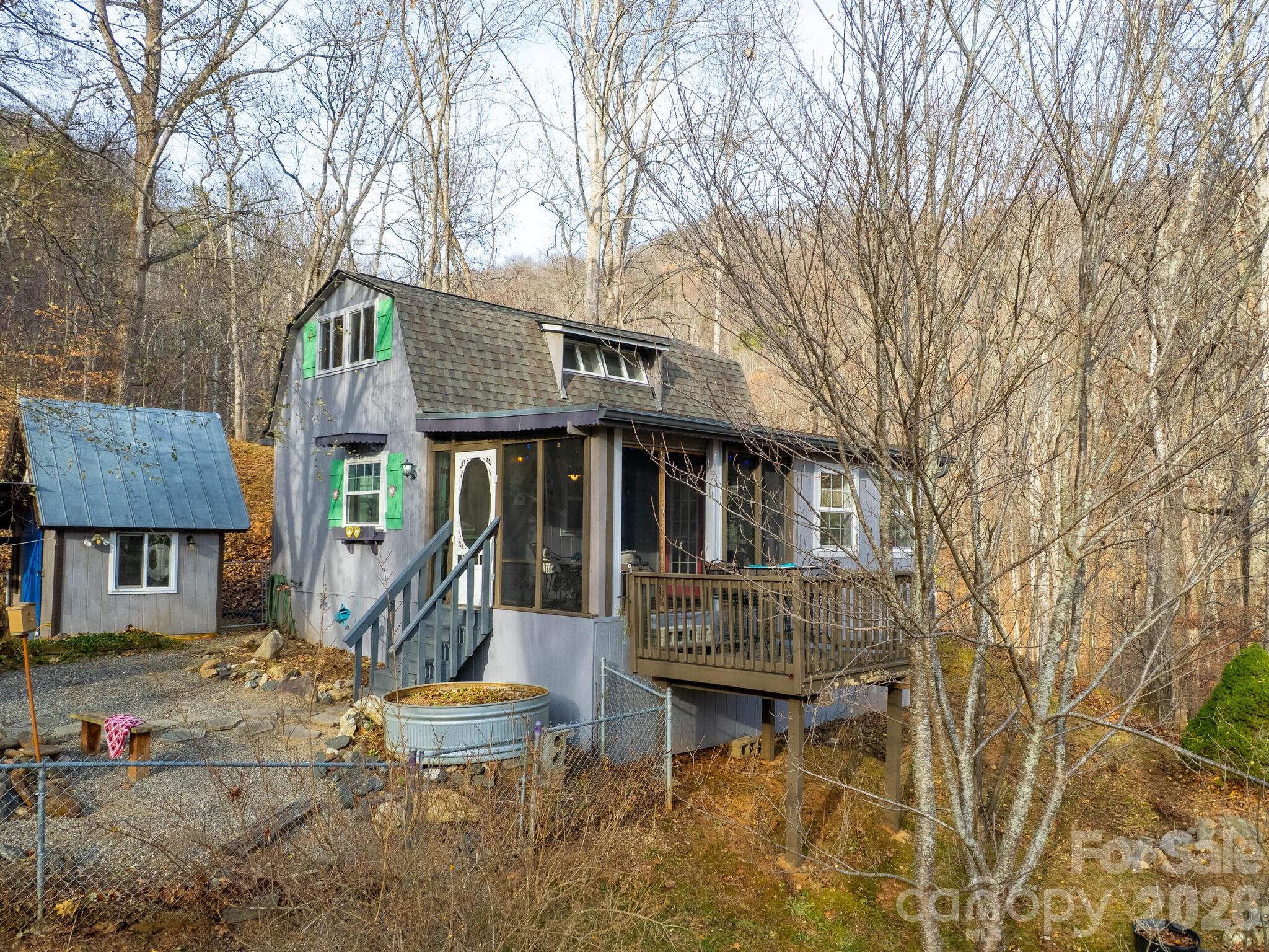 90 Davidson Gap Road Leicester, NC 28748 - Photo 45 of 46 a front view of a house with garden