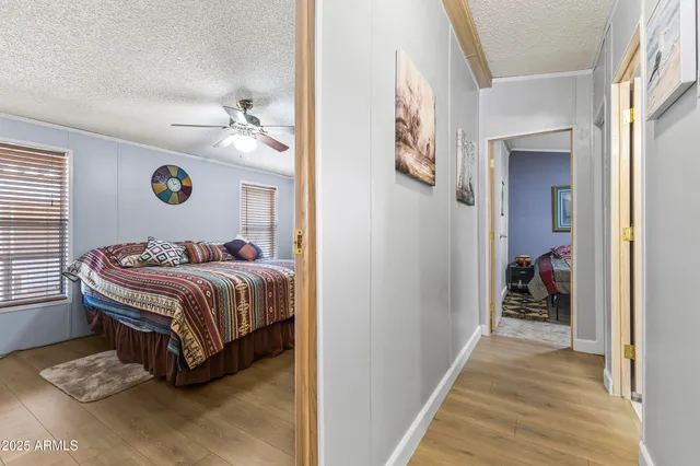 a bedroom with a bed and a table