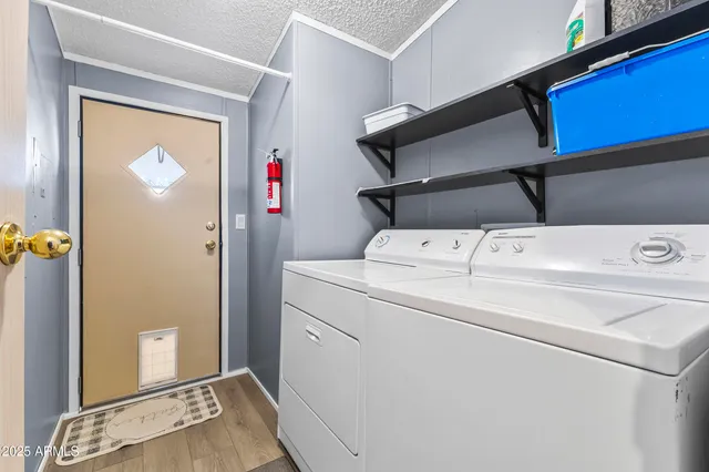 a utility room with dryer and washer