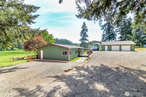 a house view with a backyard space