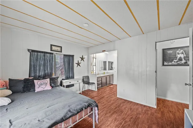 a bed room with a bed and a couch