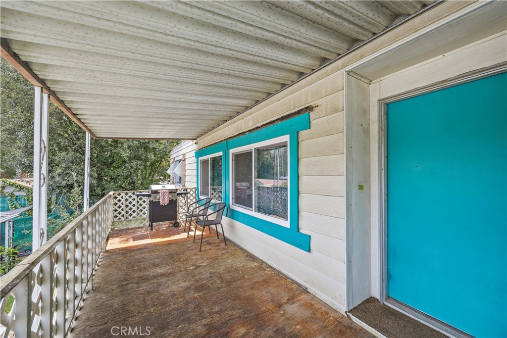 5700 Carbon Canyon Road, Unit 107 Brea, CA 92823 - Photo 6 of 27 a balcony with furniture and garden