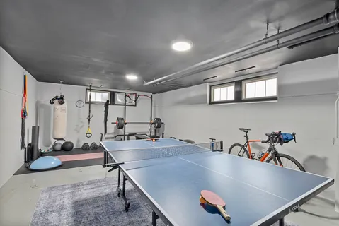 a view of a workspace with furniture