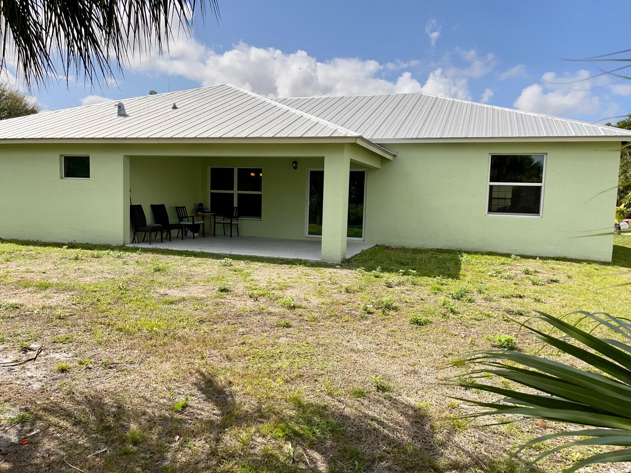 3279 Southwest Constellation Road Port St. Lucie, FL 34953 - Photo 21 of 21 backyard