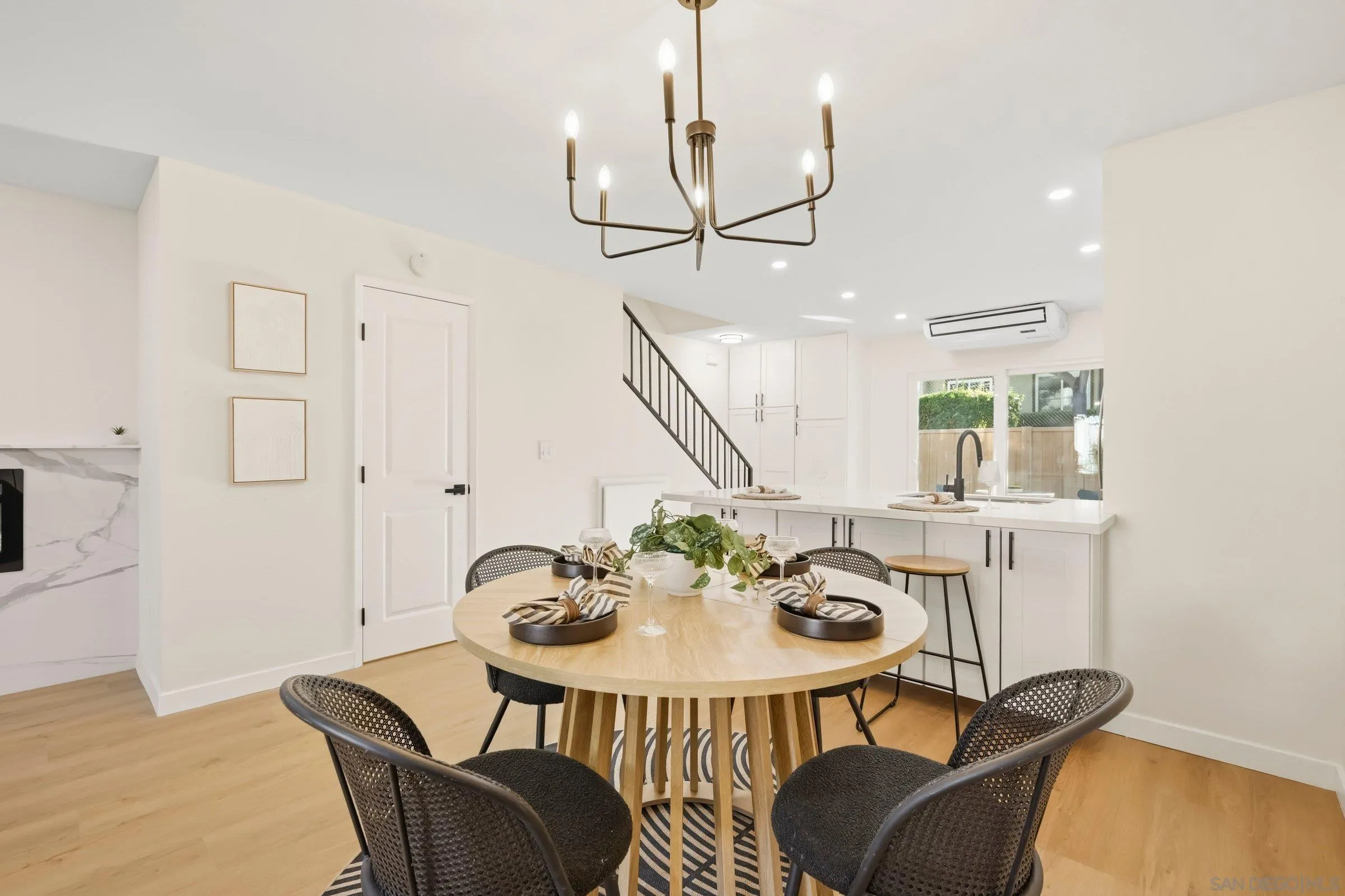 458 Ridgeway Court Spring Valley, CA 91977 - Photo 5 of 26 a view of a dining room with furniture and wooden floor