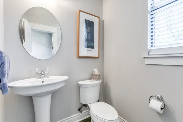 a bedroom with bed and window