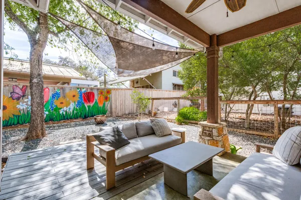 a bathroom with a toilet a sink and a mirror