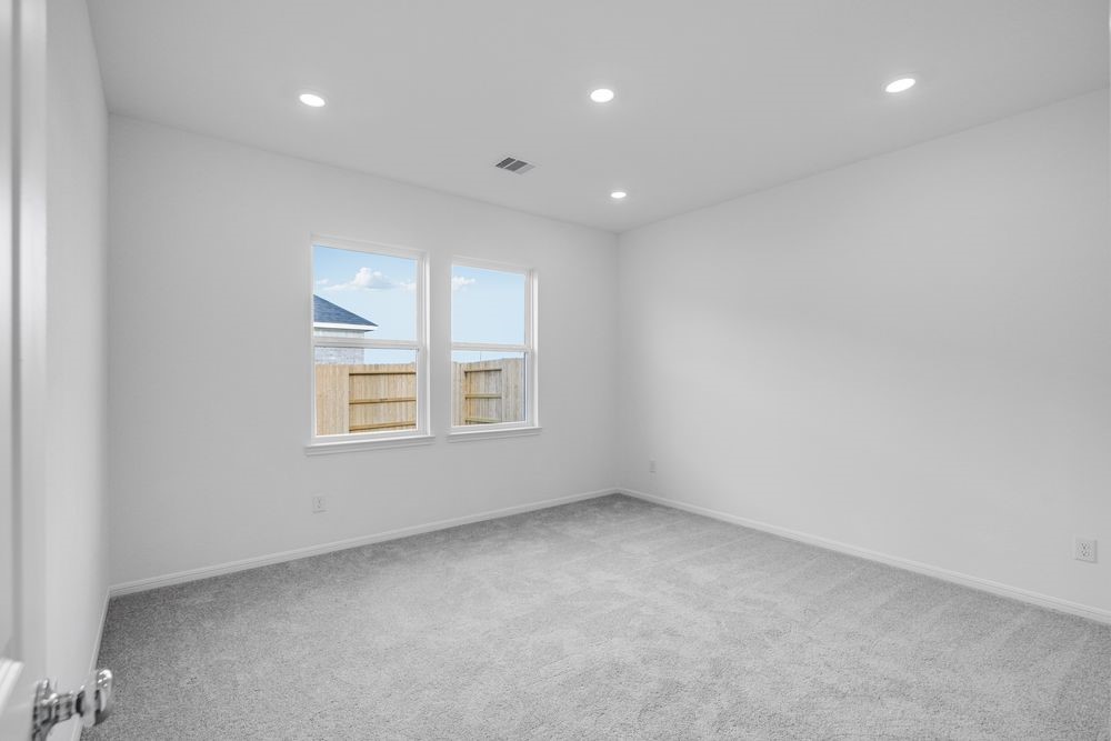 5606 Buttonbush Court Rosenberg, TX 77471 - Photo 13 of 34 an empty room with windows