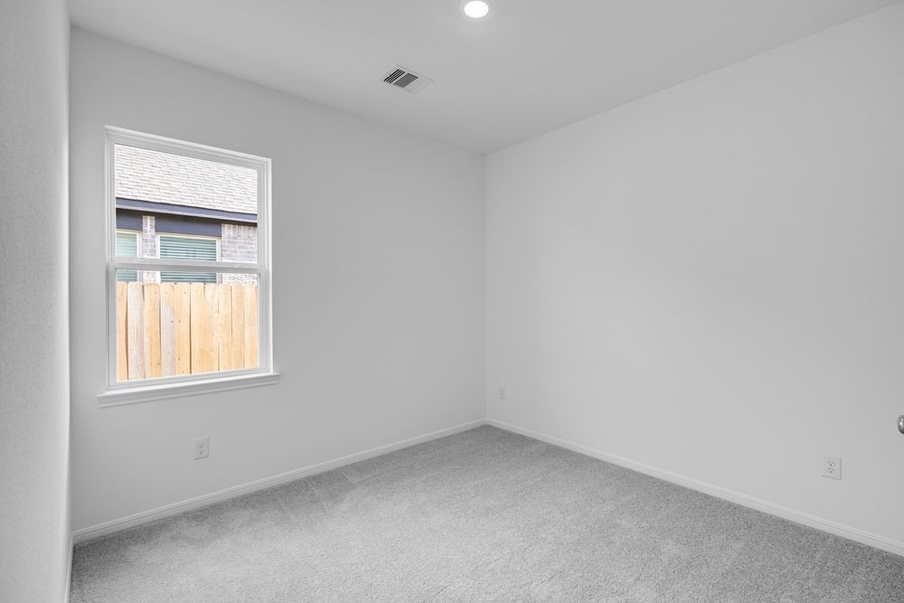 5606 Buttonbush Court Rosenberg, TX 77471 - Photo 18 of 34 an empty room with a window