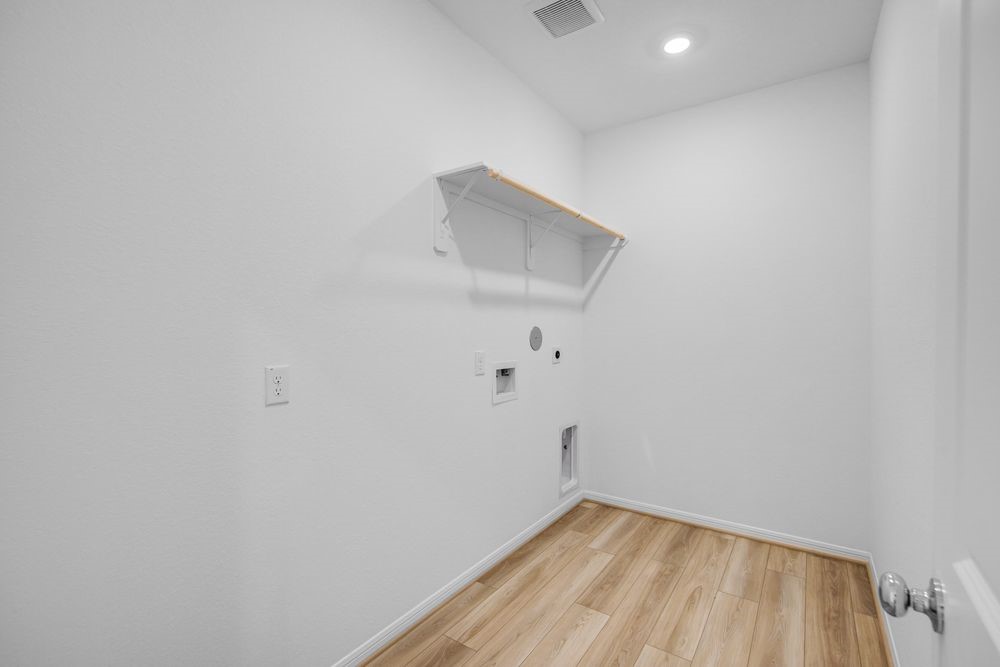 5606 Buttonbush Court Rosenberg, TX 77471 - Photo 21 of 34 a view of a room with wooden floor