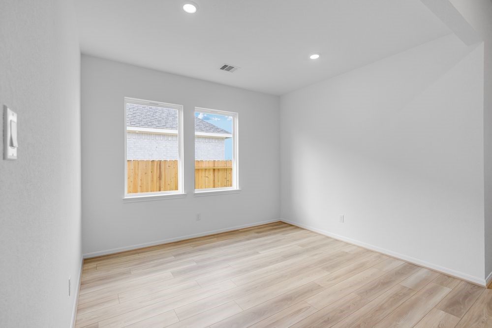 5606 Buttonbush Court Rosenberg, TX 77471 - Photo 22 of 34 an empty room with a window