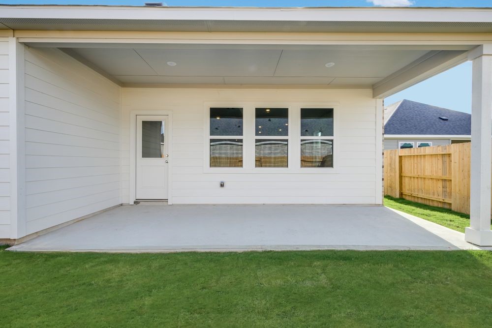 5606 Buttonbush Court Rosenberg, TX 77471 - Photo 26 of 34 a view of an empty room with a window and wooden floor