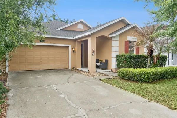 a front view of a house with a garage