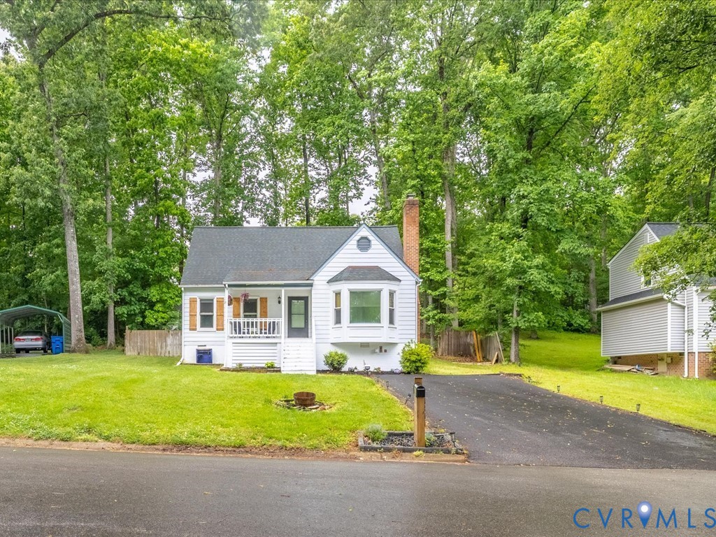 6806 Full Rack Circle Midlothian, VA 23112 - Photo 26 of 29 a front view of house with yard and green space