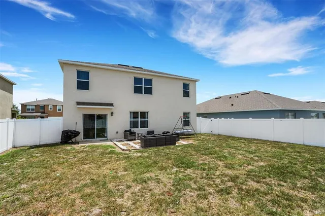 a view of a house with a patio