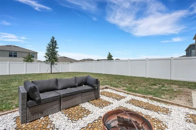 a view of a terrace with furniture