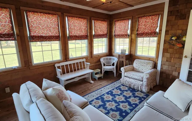 a bathroom with a sink toilet and mirror