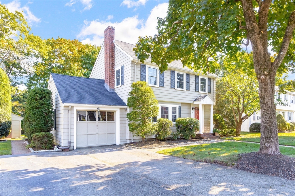 55 Berkshire Road Needham, MA 02492 - Photo 27 of 33 a front view of a house with garden