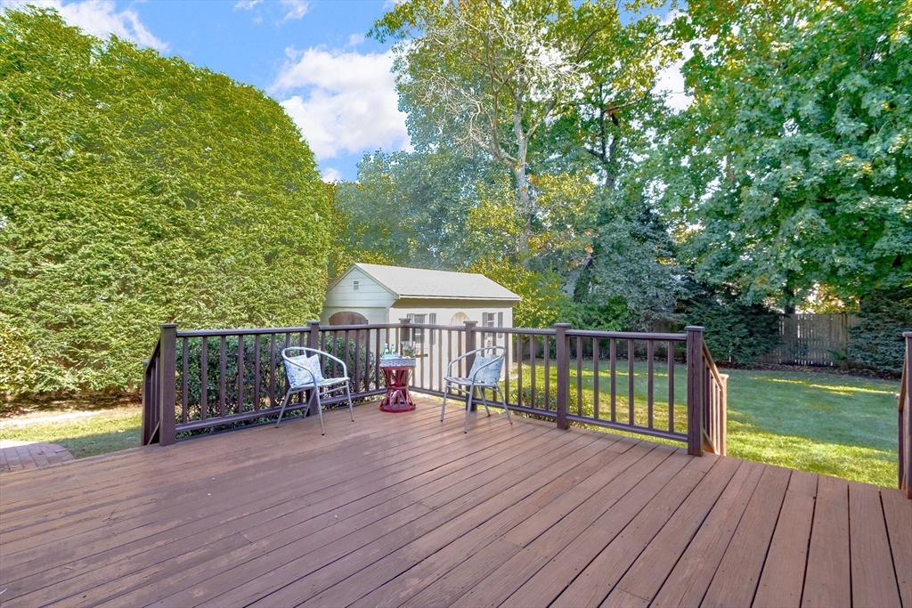 55 Berkshire Road Needham, MA 02492 - Photo 29 of 33 a view of house with deck and outdoor seating