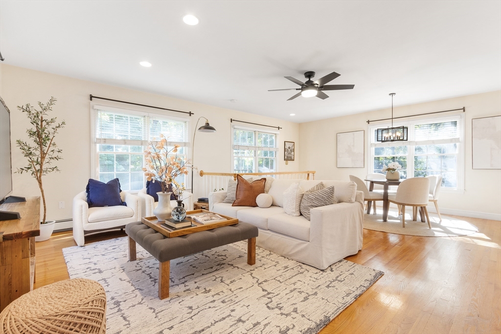 55 Berkshire Road Needham, MA 02492 - Photo 5 of 33 a living room with furniture and a large window