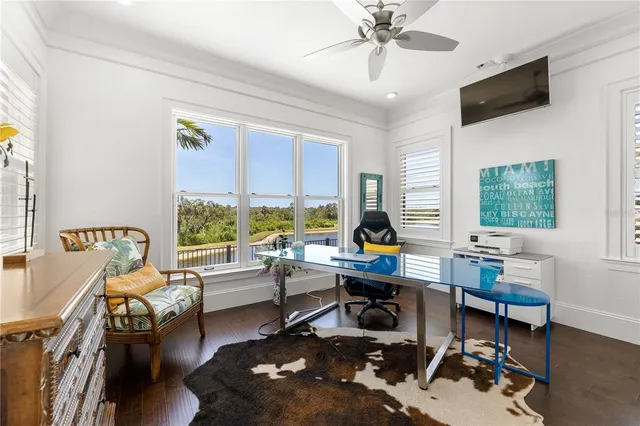 a bathroom with a granite countertop sink a mirror and vanity