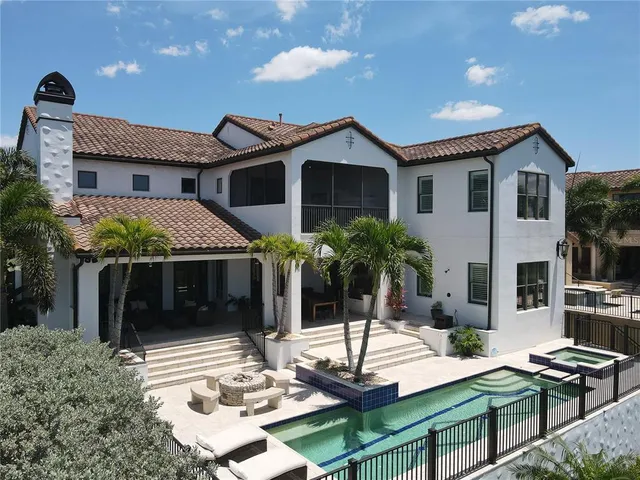 a front view of house with yard and outdoor seating