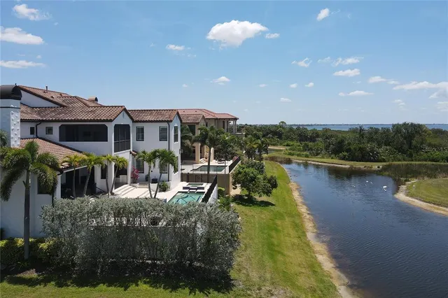 a view of a house with lake view