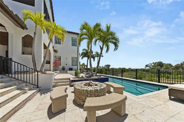 a view of a terrace with couches and wooden floor