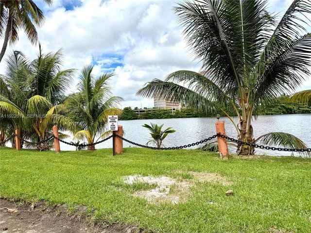 a view of a lake with a garden