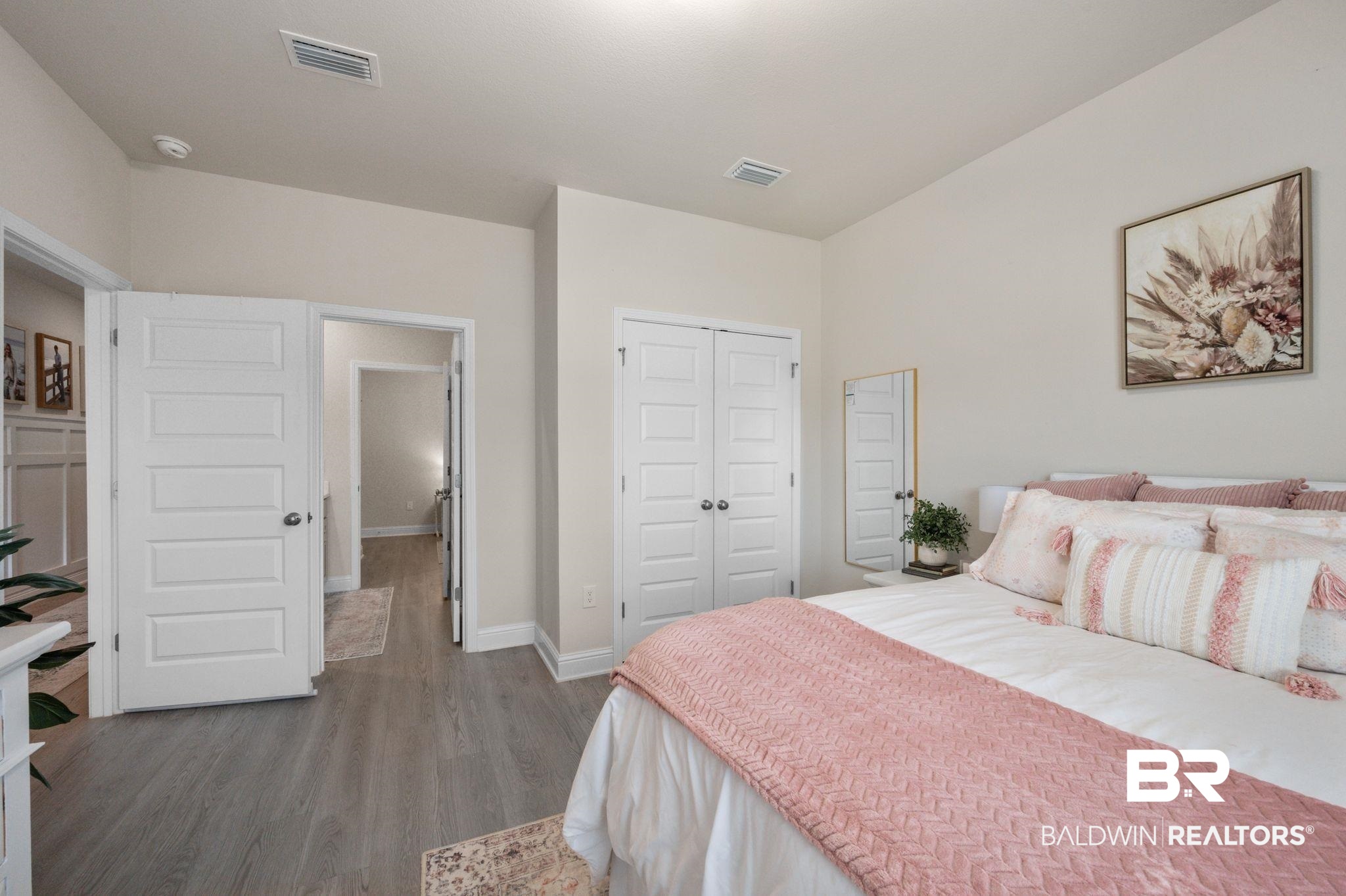 681 Calibre Street Fairhope, AL 36532 - Photo 8 of 56 Bedroom with a closet and wood-type flooring