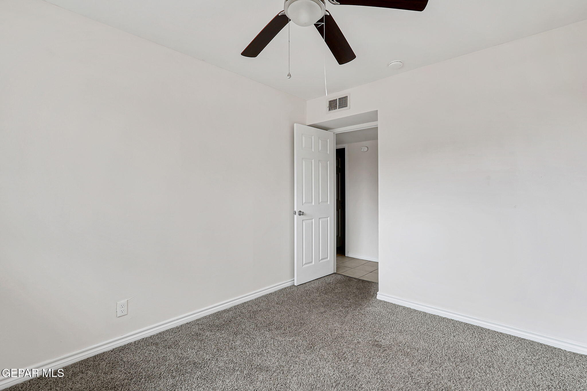 4956 Rutherford Drive El Paso, TX 79924 - Photo 16 of 41 a view of hallway with a ceiling fan