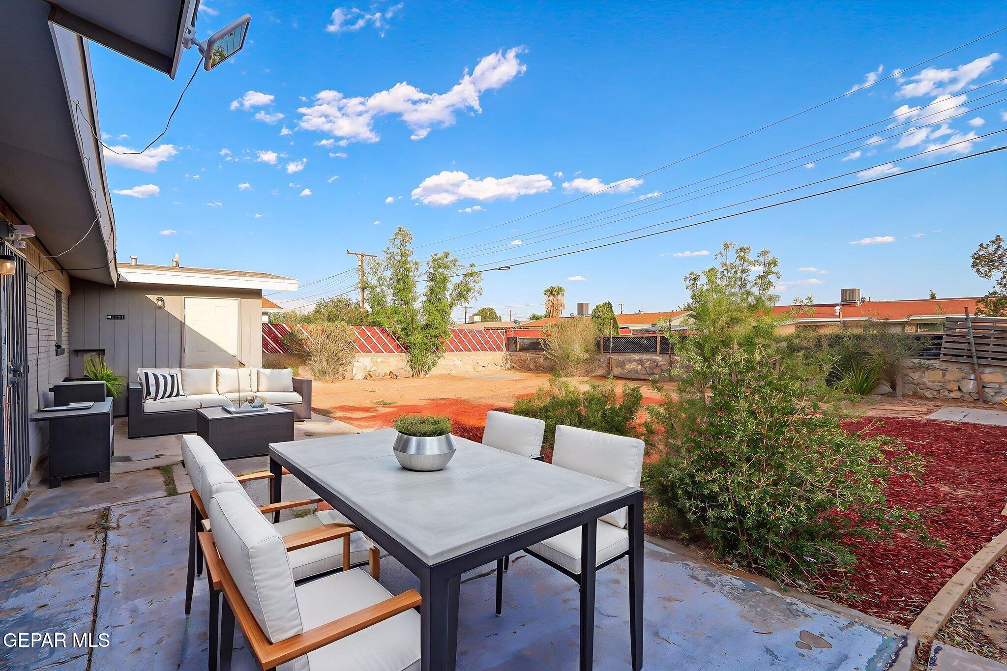4956 Rutherford Drive El Paso, TX 79924 - Photo 28 of 41 a outdoor dining space with furniture and city view