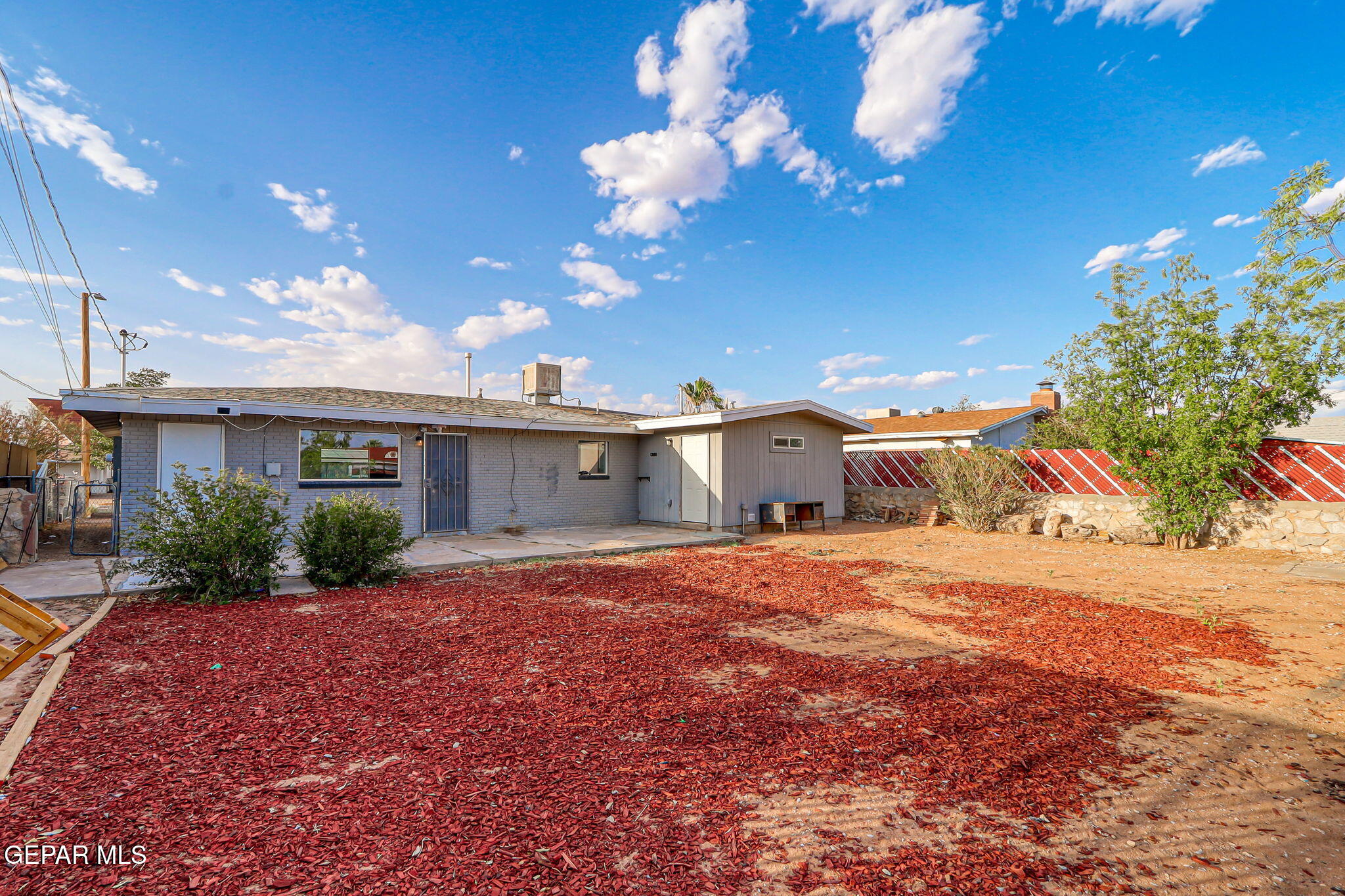 4956 Rutherford Drive El Paso, TX 79924 - Photo 29 of 41 a view of a house with a yard